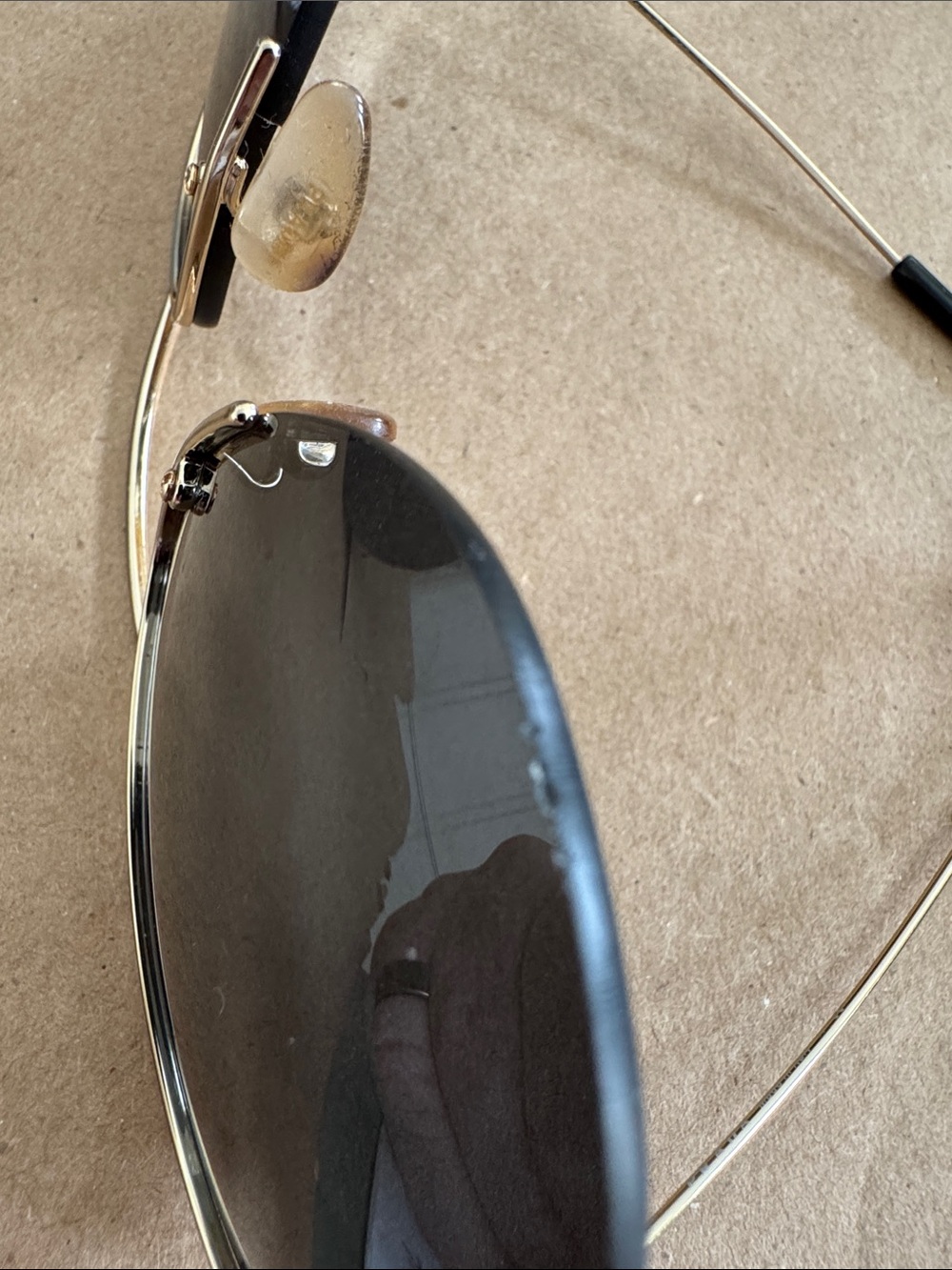 Prada Men’s Black Temples with Gold Accents Rimless Sunglasses - Picture 7 of 7
